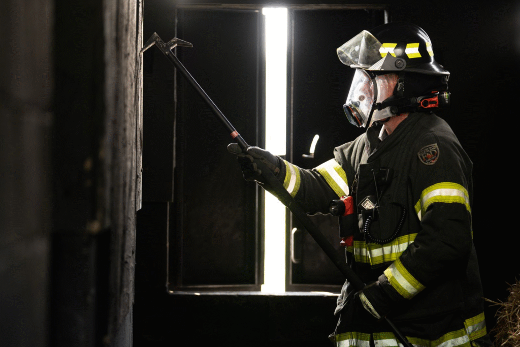 Firefighter wearing a CleanSpace mask in a fire hazard area
